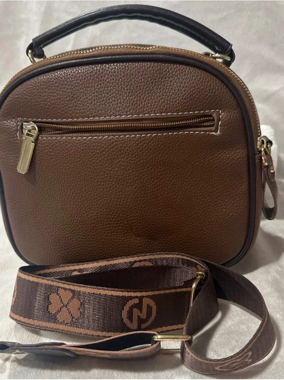 Brown Pebbled Crossbody Bag with Gold Emblem